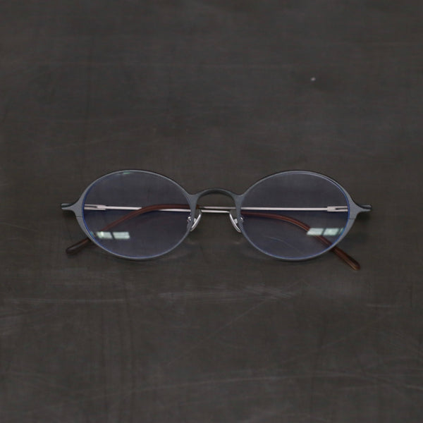 Rigards Oval Aluminum Magnesium Alloy Frame Eyeglasses RG0103AL Series Collection RG-RG0103AL-SNTM Cement Transparent
